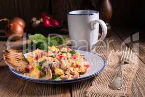 Scrambled eggs with tomatoes and spinach