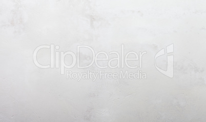 Grungy white concrete wall background Grungy white concrete wall background