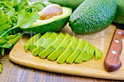 Avocado slices on board