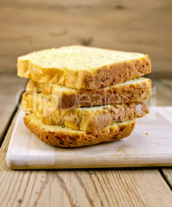 Bread wheat homemade slices on board