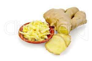 Ginger grated in bowl with root