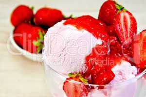 Ice cream strawberry in glass bowl on fabric