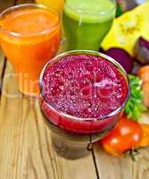 Juice beetroot and vegetable on board top