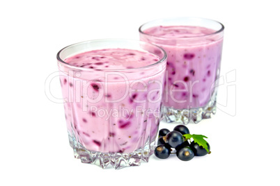 Milkshake with black currants in two glass