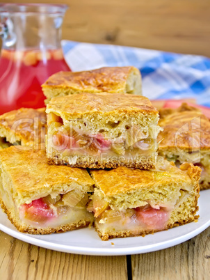 Pie rhubarb in plate and juice on board