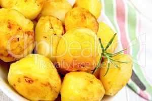 Potatoes fried on plate with napkin