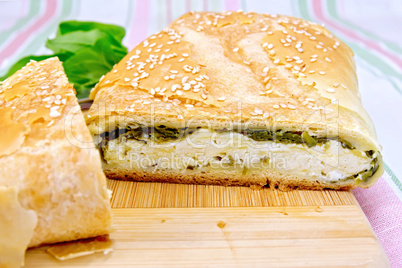 Roll filled with spinach and cheese on cloth