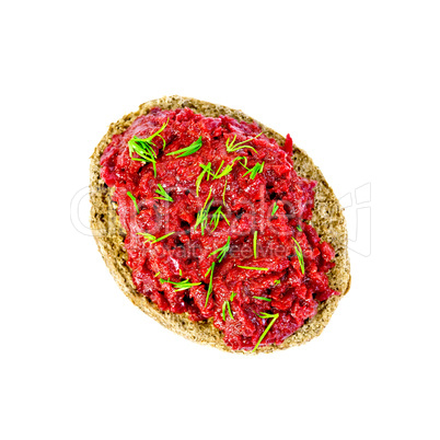 Sandwich with beet caviar and dill on top