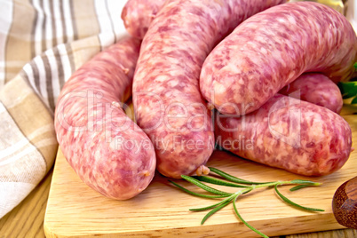 Sausages pork on board with napkin