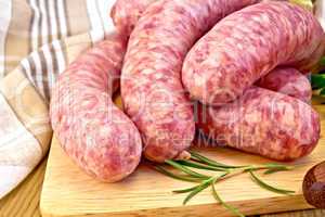 Sausages pork on board with napkin