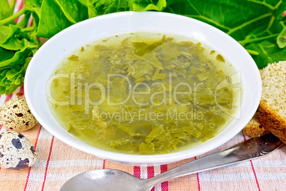 Soup of greenery on linen fabric
