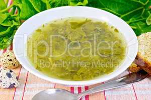 Soup of greenery on linen fabric