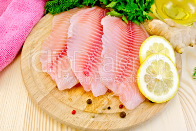 Tilapia with oil and lemon on board