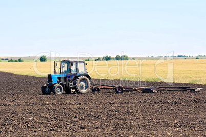 Tractor wheeled plowing
