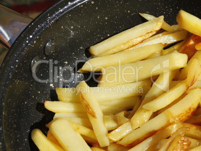 Potato chips in a frying pan