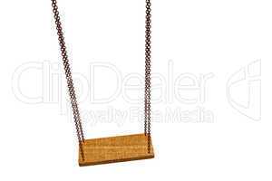 Empty wooden swing on the chain