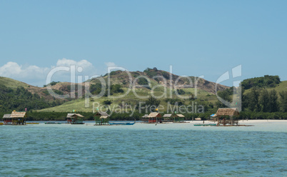 Floating Huts Along Beach Shoreline