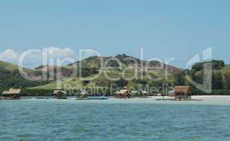 Floating Huts Along Beach Shoreline