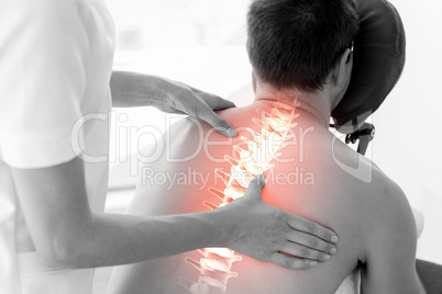 Highlighted spine of man at physiotherapy
