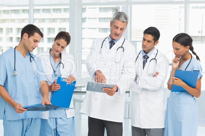 Portrait of confident doctors with arms crossed