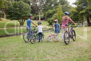 Family on their bike at the park