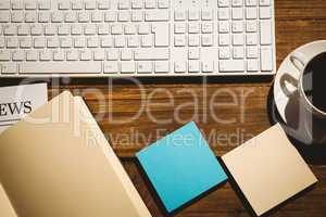 Overhead shot of post its and keyboard