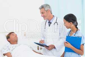 Doctor explaining report to patient