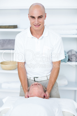 Man receiving head massage