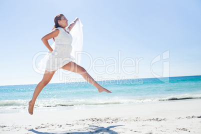 Peaceful brunette jumping