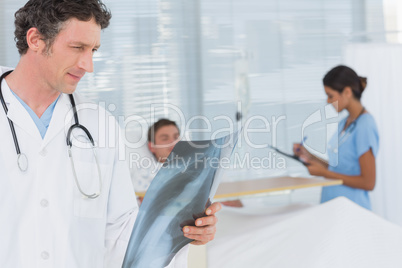 Doctor checking patients xray