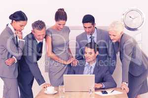 Business people using laptop