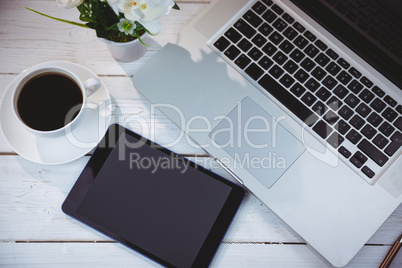 Overhead shot of laptop and tablet