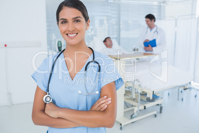 Smiling doctor looking at camera