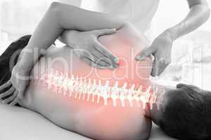 Highlighted spine of man at physiotherapy