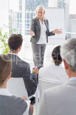 Businesswoman doing speech during meeting