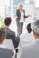 Businesswoman doing speech during meeting