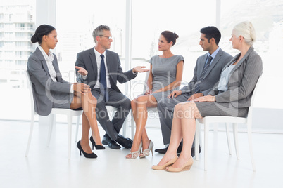 Business people in board room meeting