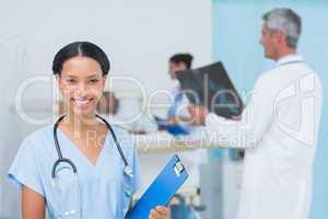 Doctors and patient with x-ray in hospital