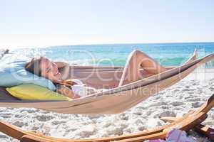 Brunette relaxing in the hammock