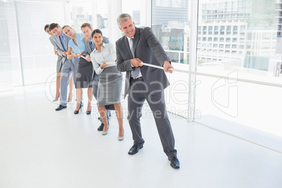 Business team pulling the rope Business team pulling the rope