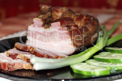 pieces of fresh cooked meat with spring onions