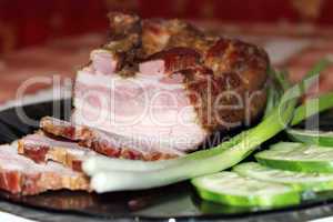 pieces of fresh cooked meat with spring onions