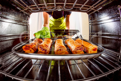 Cooking in the oven at home.