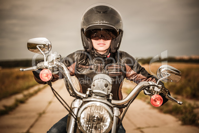 Biker girl on a motorcycle