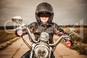 Biker girl on a motorcycle