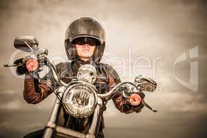 Biker girl on a motorcycle