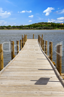 Wooden walkway at a lake