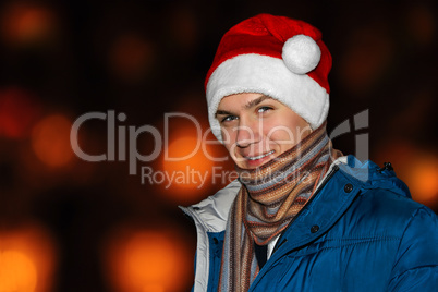 The young man in a Santa hat