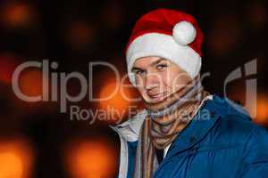The young man in a Santa hat