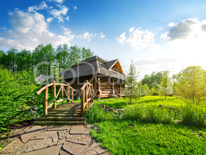 Wooden bridge and house